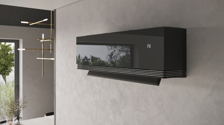 Cận cảnh bề mặt gương kính đen của máy lạnh LG ARTCOOL